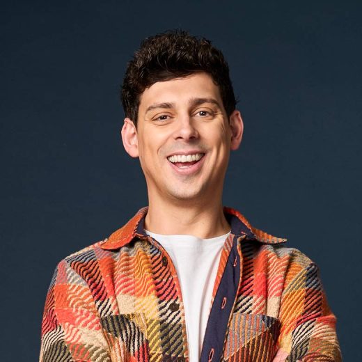Matt Richardson, smiling with arms folded